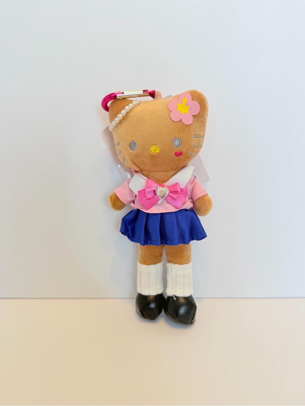Sanrio Brown Kitty Plush Keychain with Pink Top and Blue Skirt